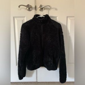 Black fully-zipped fleece jacket with pockets by Forever 21; size small
